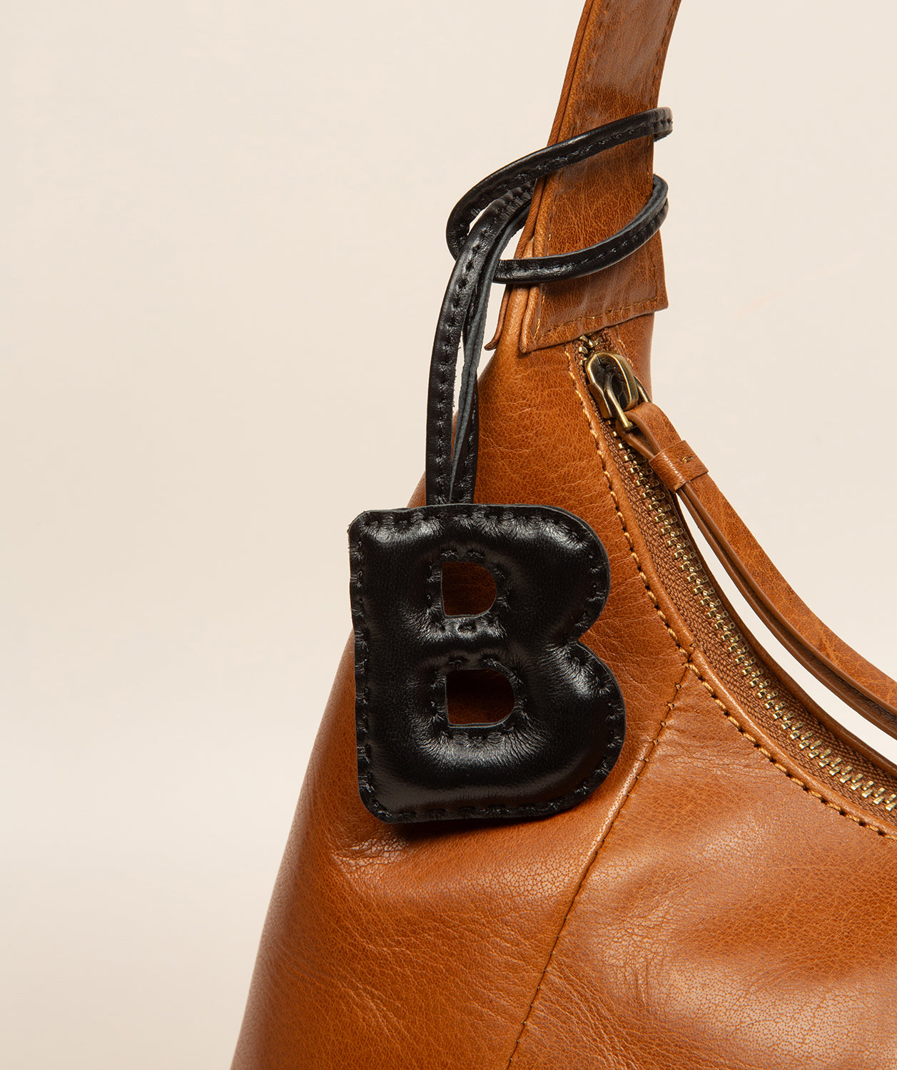 black leather charm showing soft finish and craftsmanship