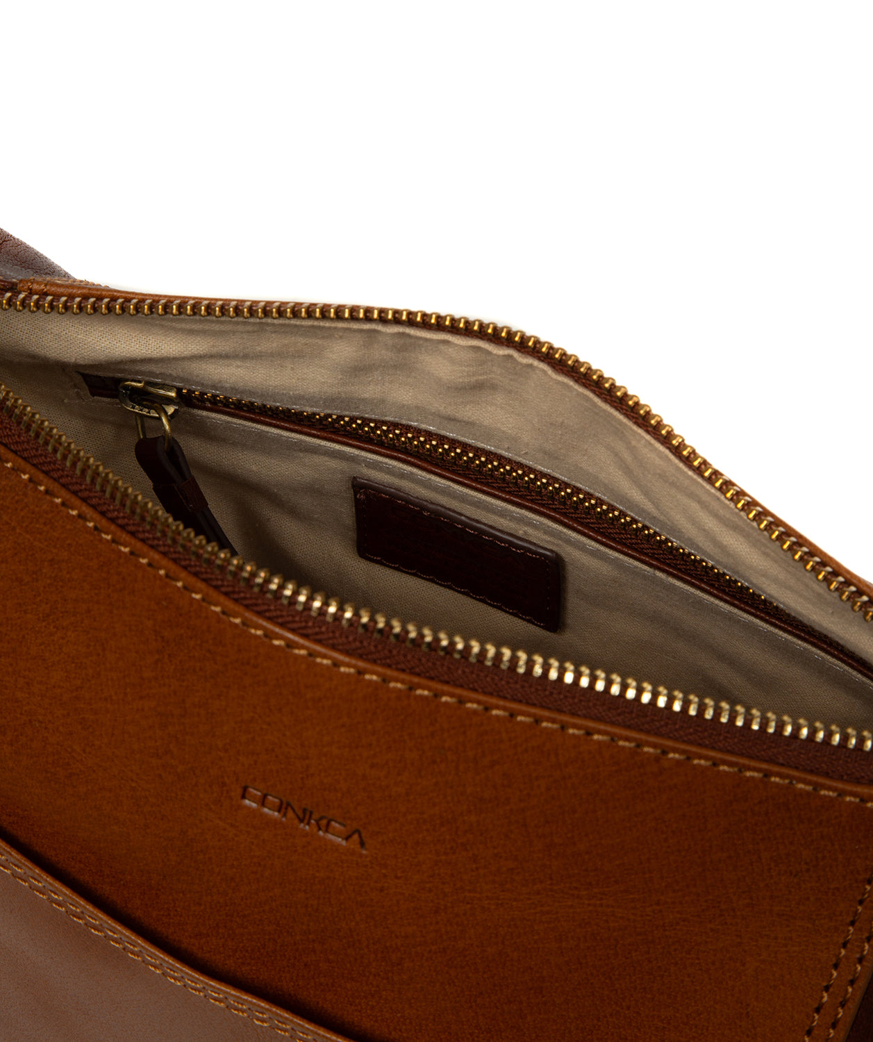 Back slip pocket detail on Indigo leather shoulder bag