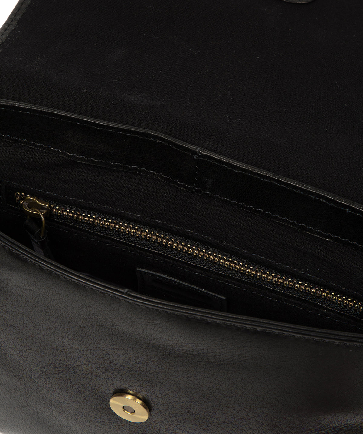 Magnetic press stud closure on fold-over flap