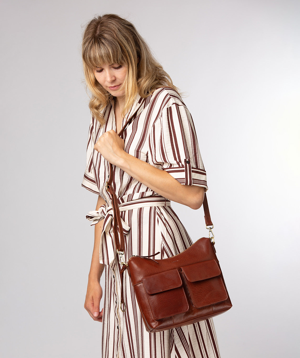 Conkca London Snowdrop Conker Brown leather shoulder bag front view