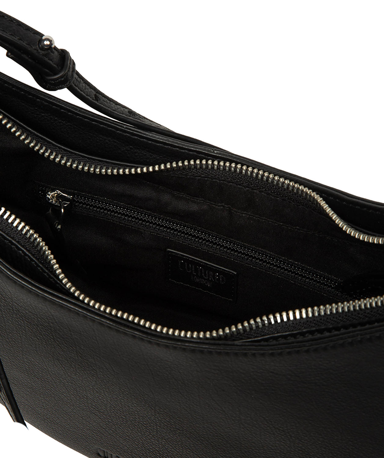 Gold-coloured metal fittings and zip detail