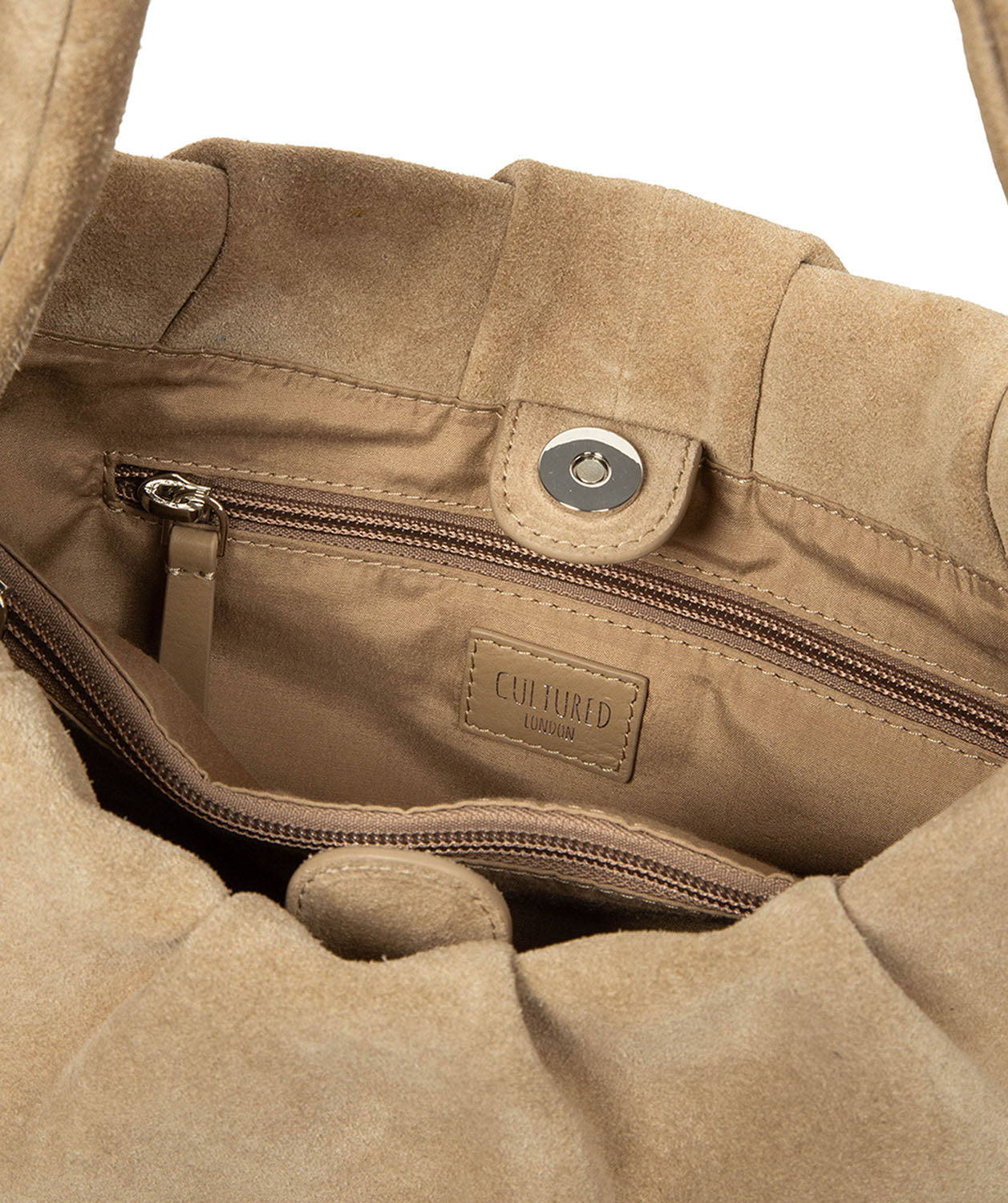 Open handbag revealing soft lined interior storage