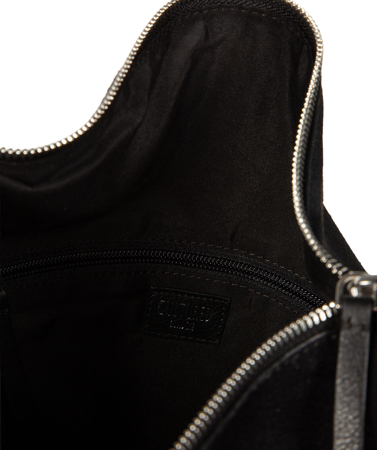 Close-up of gold-coloured metal zips and fittings