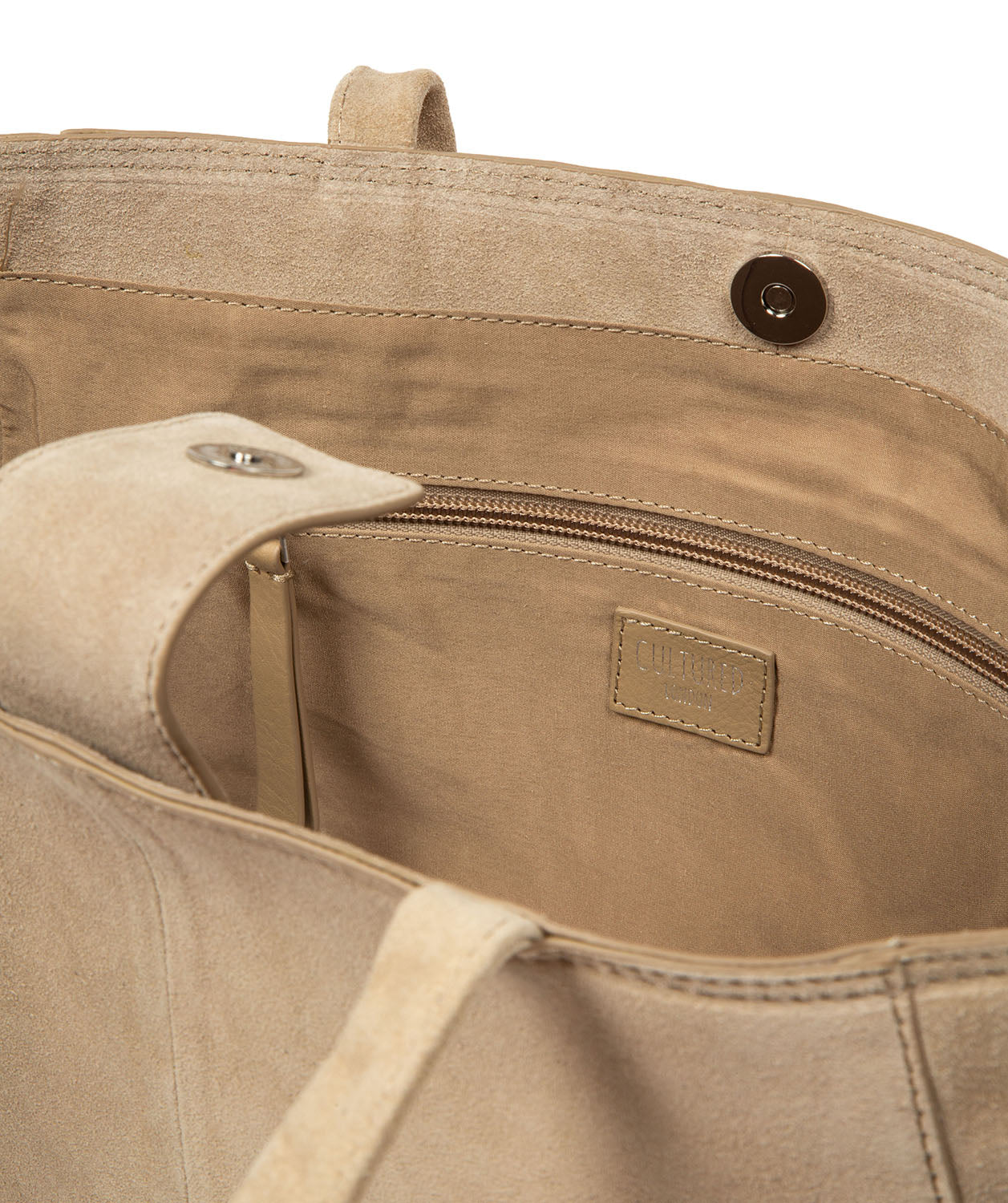 Fully lined interior with zipped pocket and slip pockets