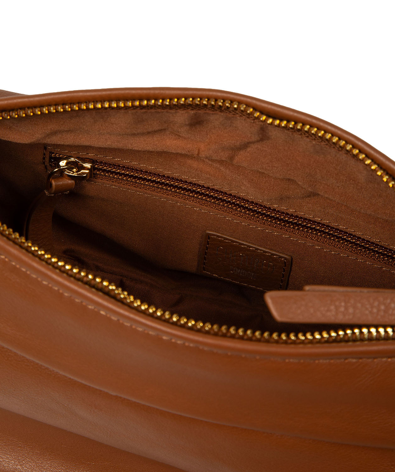 Nuala bag flat lay showing structured design and hanging charm