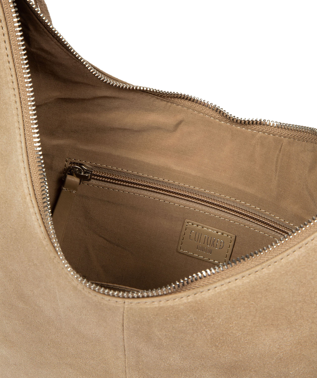 Side profile showing bag structure and leather trim