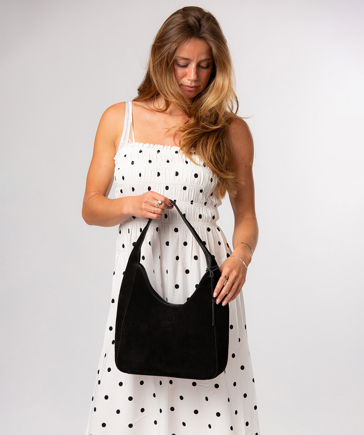 Eloise handbag with charm detail and magnetic fastener