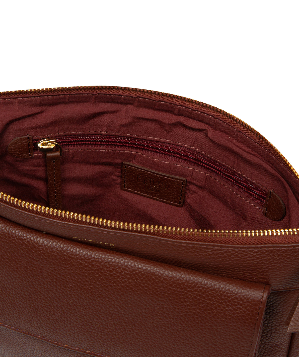 Fold-over top pocket with magnetic press stud fastening