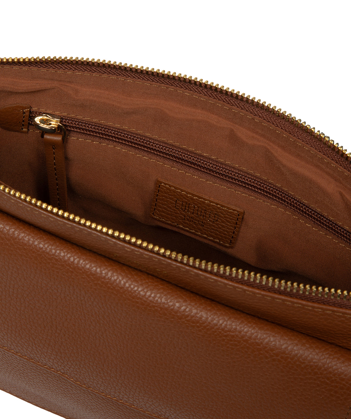 Magnetic press stud fold-over front pocket closure