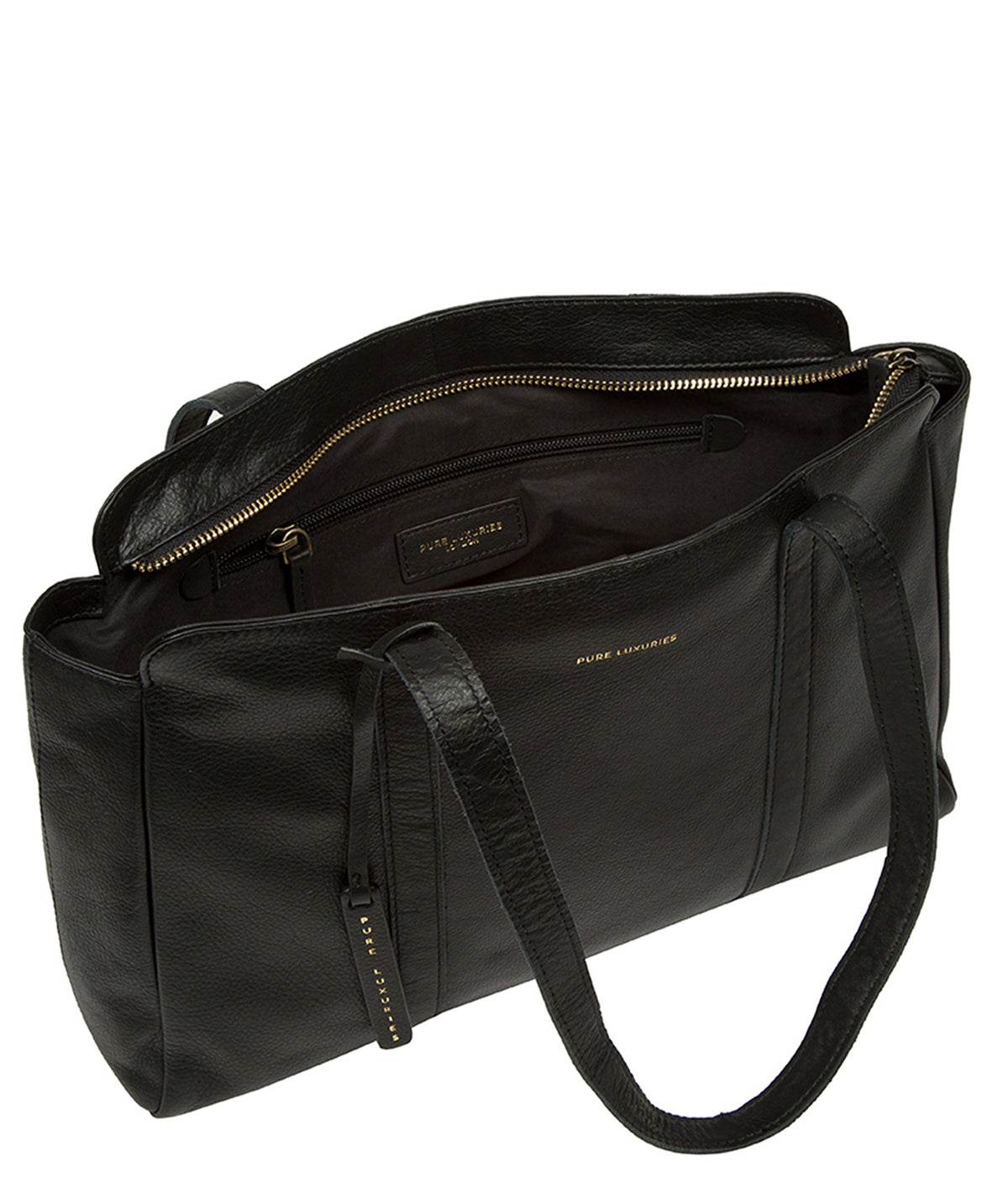 Handbag interior lining and leather handles detail