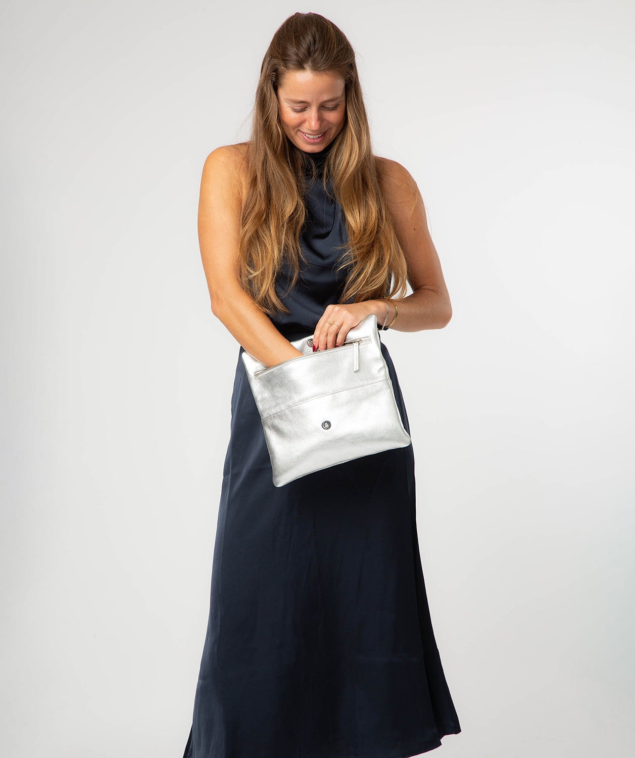 silver-toned metal fittings and zip detail on Audrina clutch