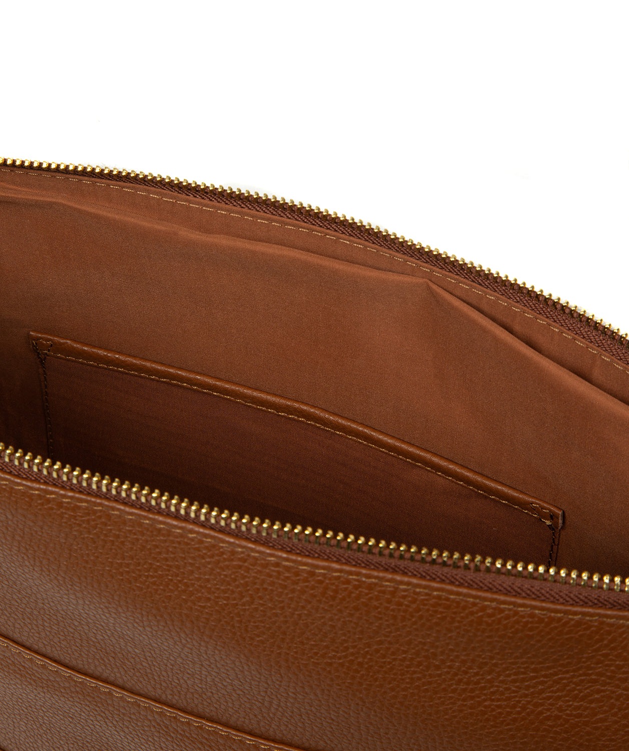 Side profile showing bag depth and strap drop