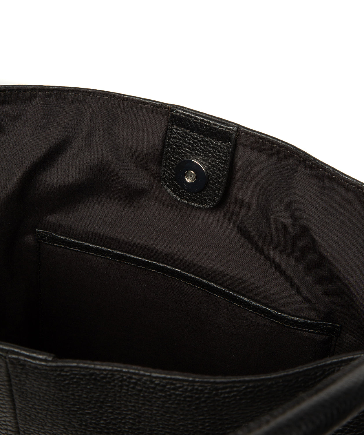 Black leather pebble grain texture close-up