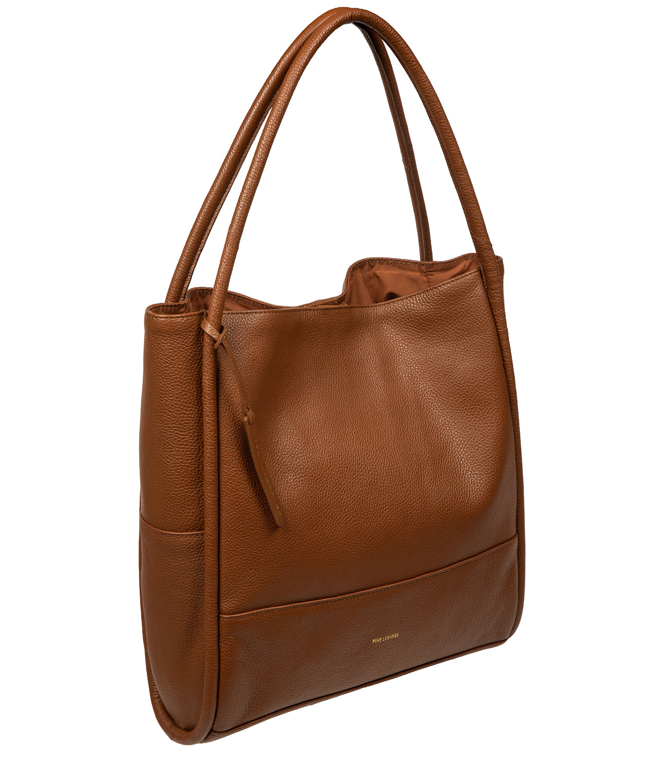 Tan leather pebble grain texture detail with patina