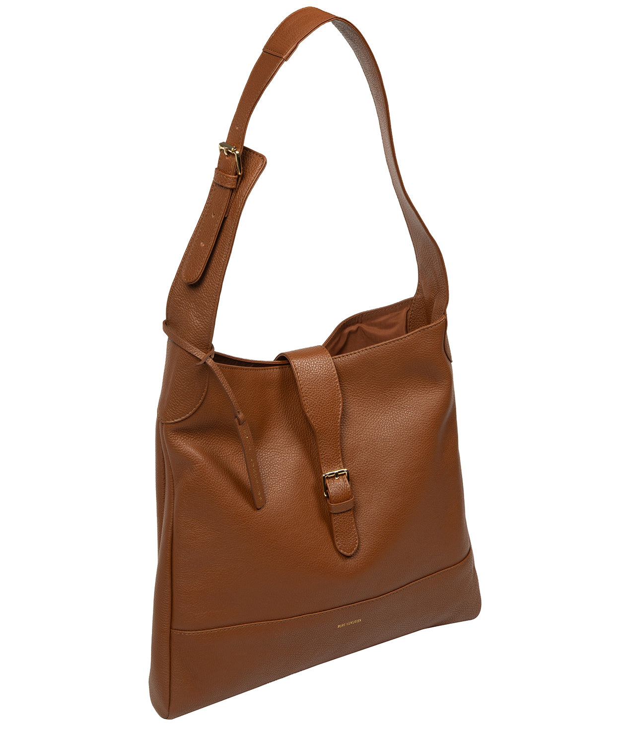 Side profile revealing pebble grain leather texture and depth