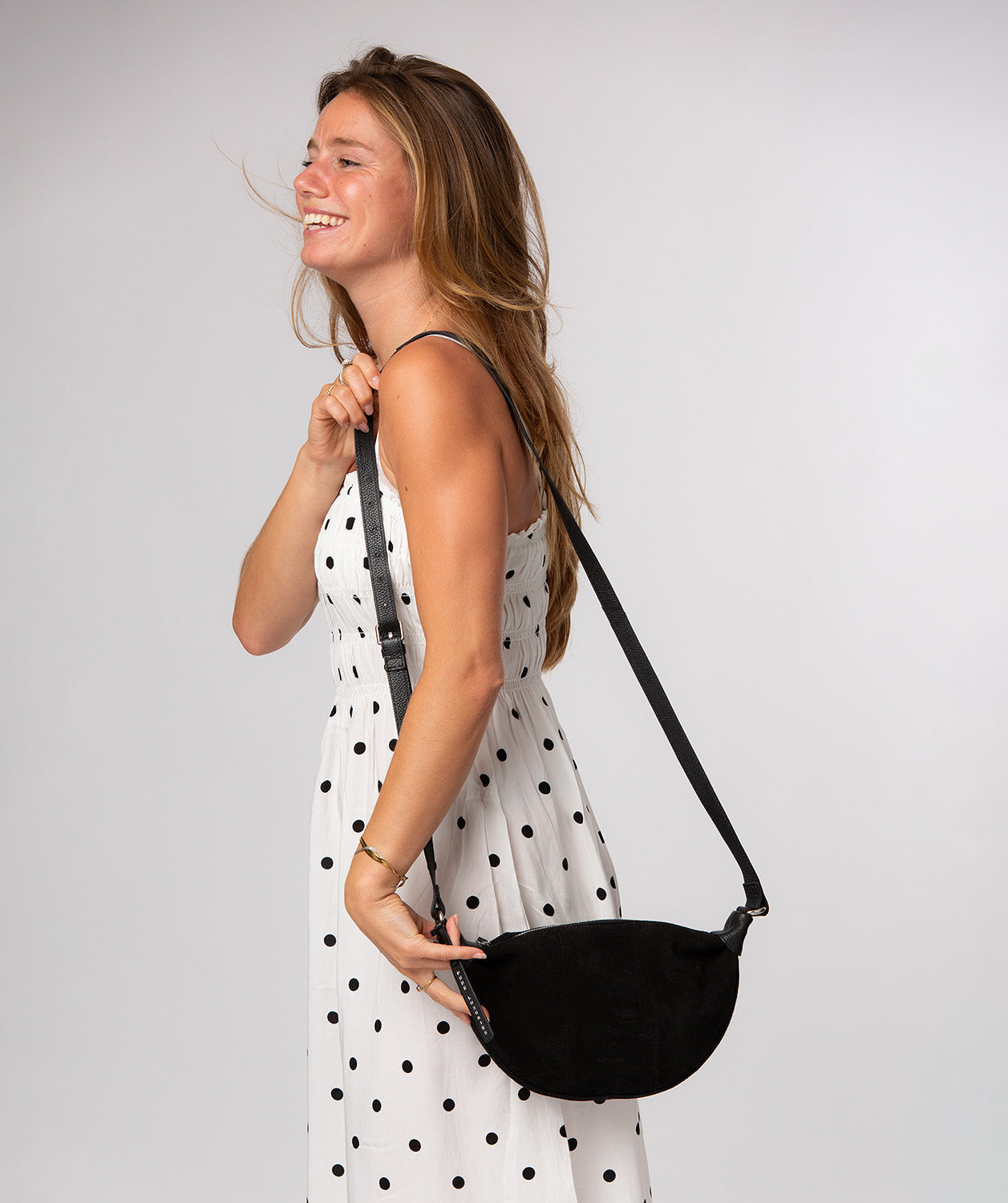 Pure Luxuries Harper black suede crossbody bag front view