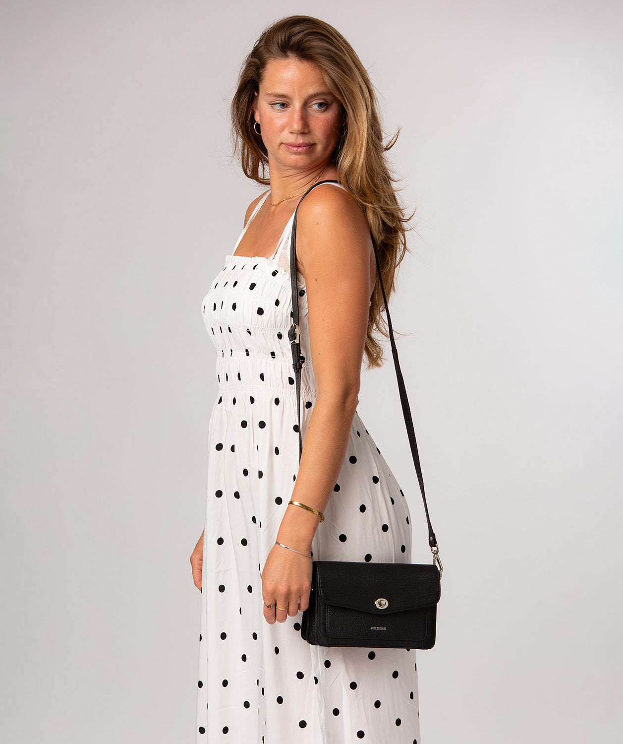 Pure Luxuries Freya black pebble grain leather crossbody clutch bag front view