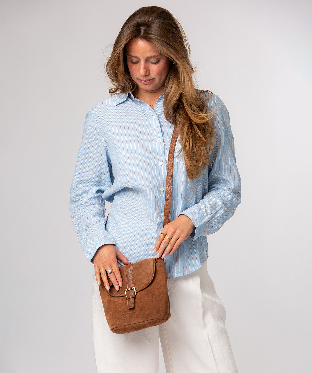 Pure Luxuries Aveline tan suede crossbody bag front view