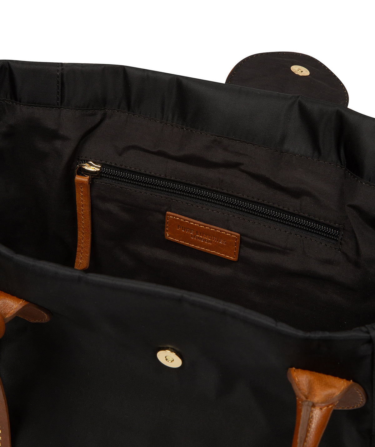 Rounded leather handles and gold foil embossed charm