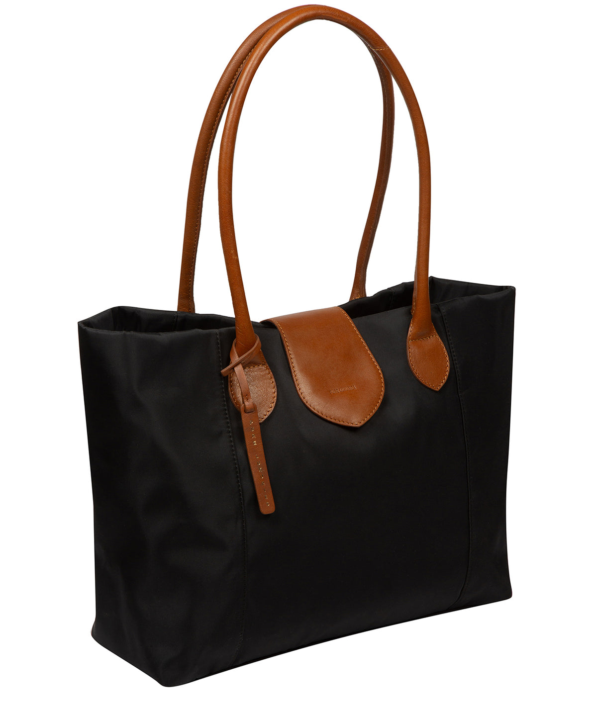 Side profile showing canvas body with leather trim