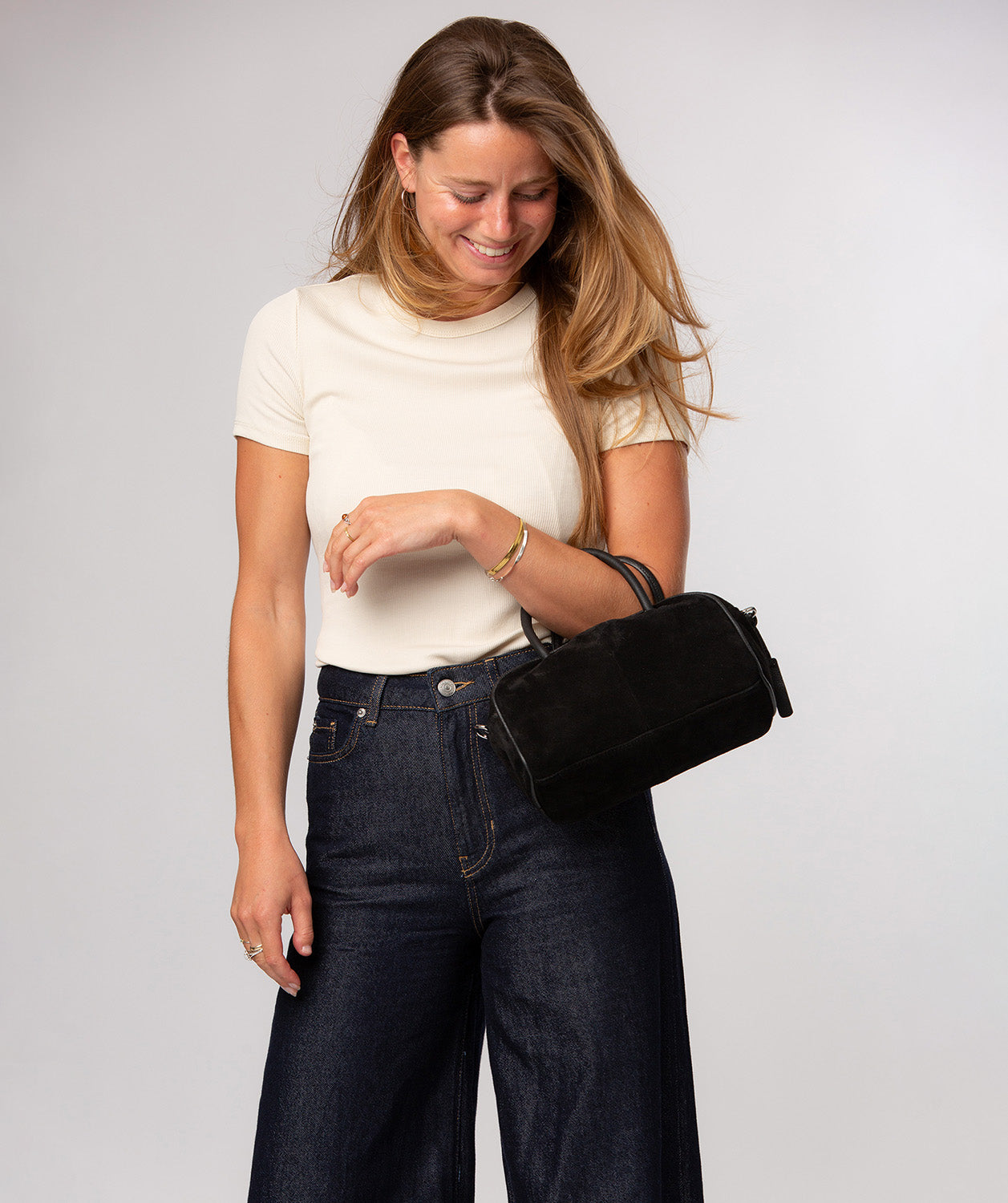 Faith bag zip-over top and interior slip pocket detail