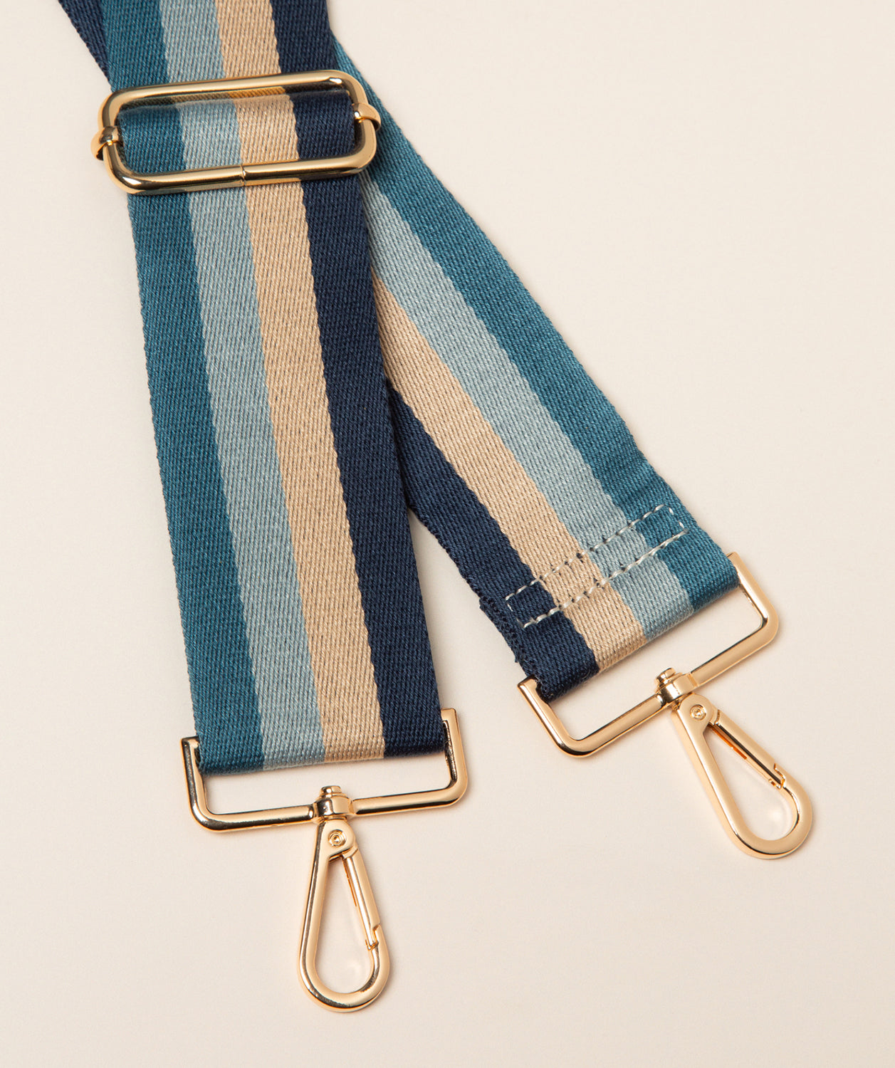 Pure Luxuries blue and gold heritage stripe canvas bag strap front view