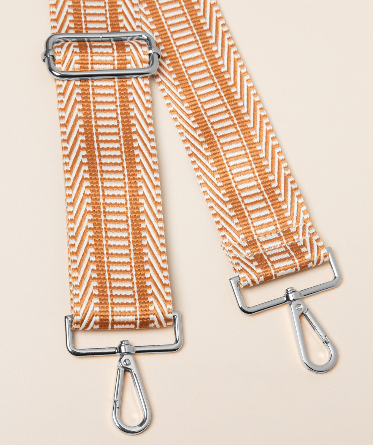 Pure Luxuries tan and cream canvas tribal pattern bag strap with silver fittings