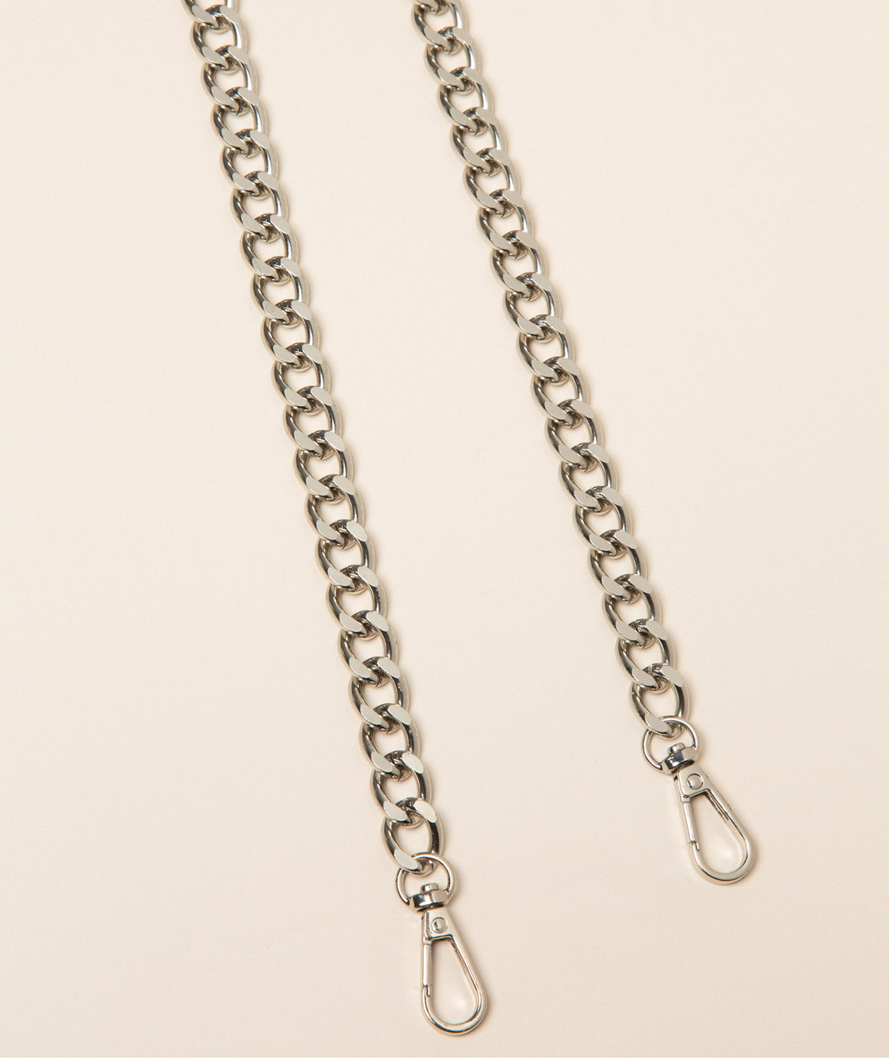 Pure Luxuries silver curb chain bag strap full view