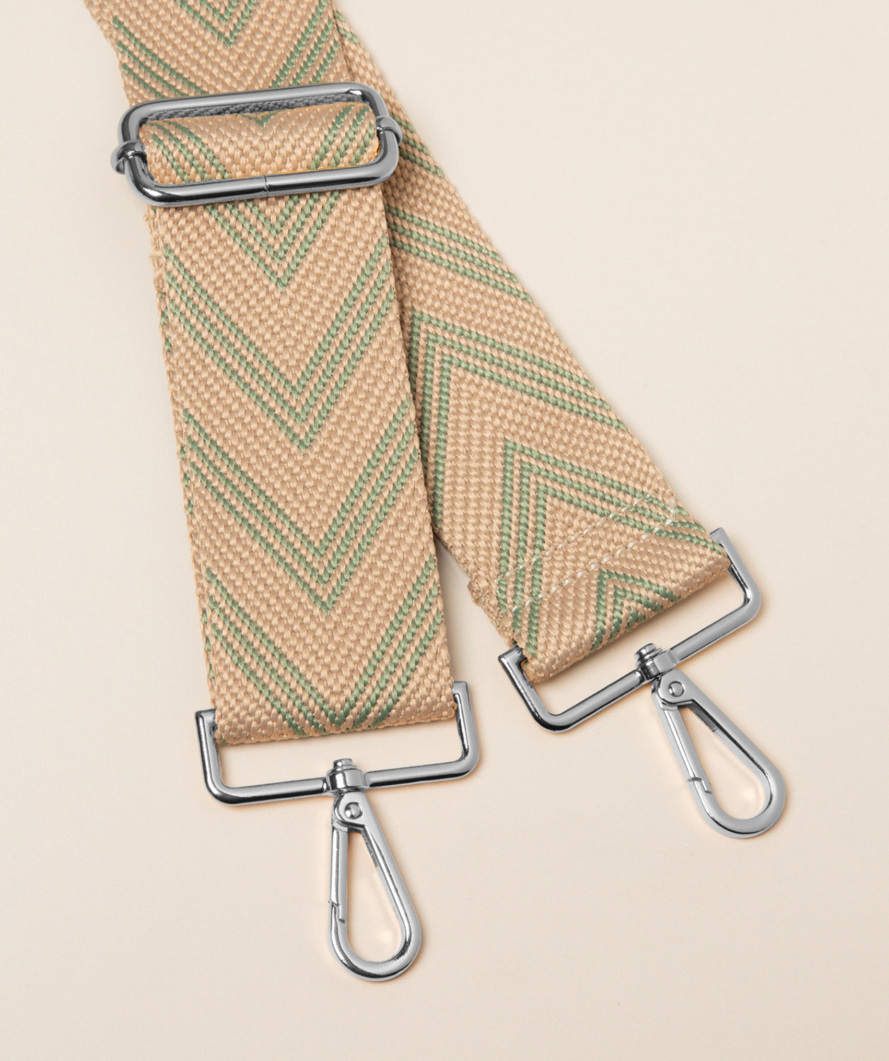 Pure Luxuries misty teal and cream chevron canvas bag strap with silver fittings front view