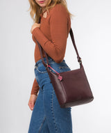 Conkca London Originals Collection #product-type#: 'Yasmin' Plum Leather Cross Body Bag