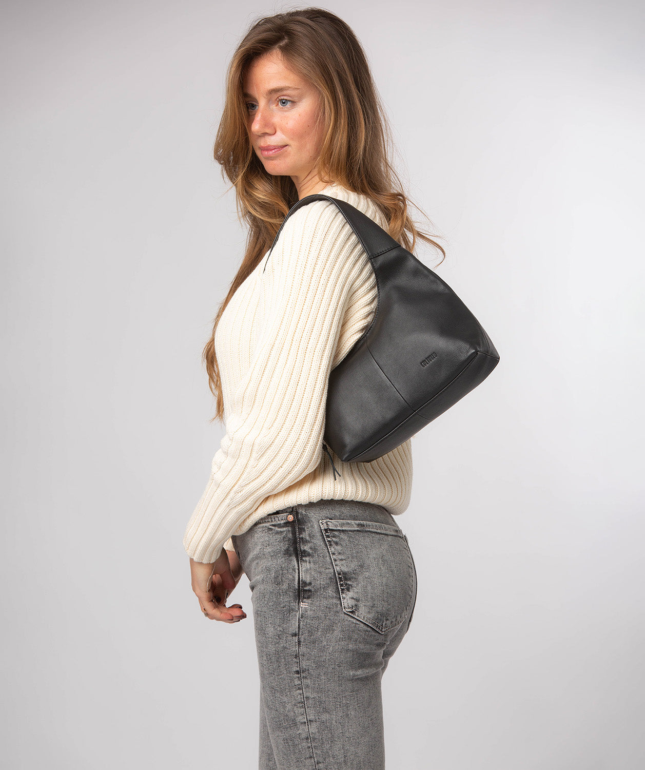 Phoenix grab bag side profile with leather handle