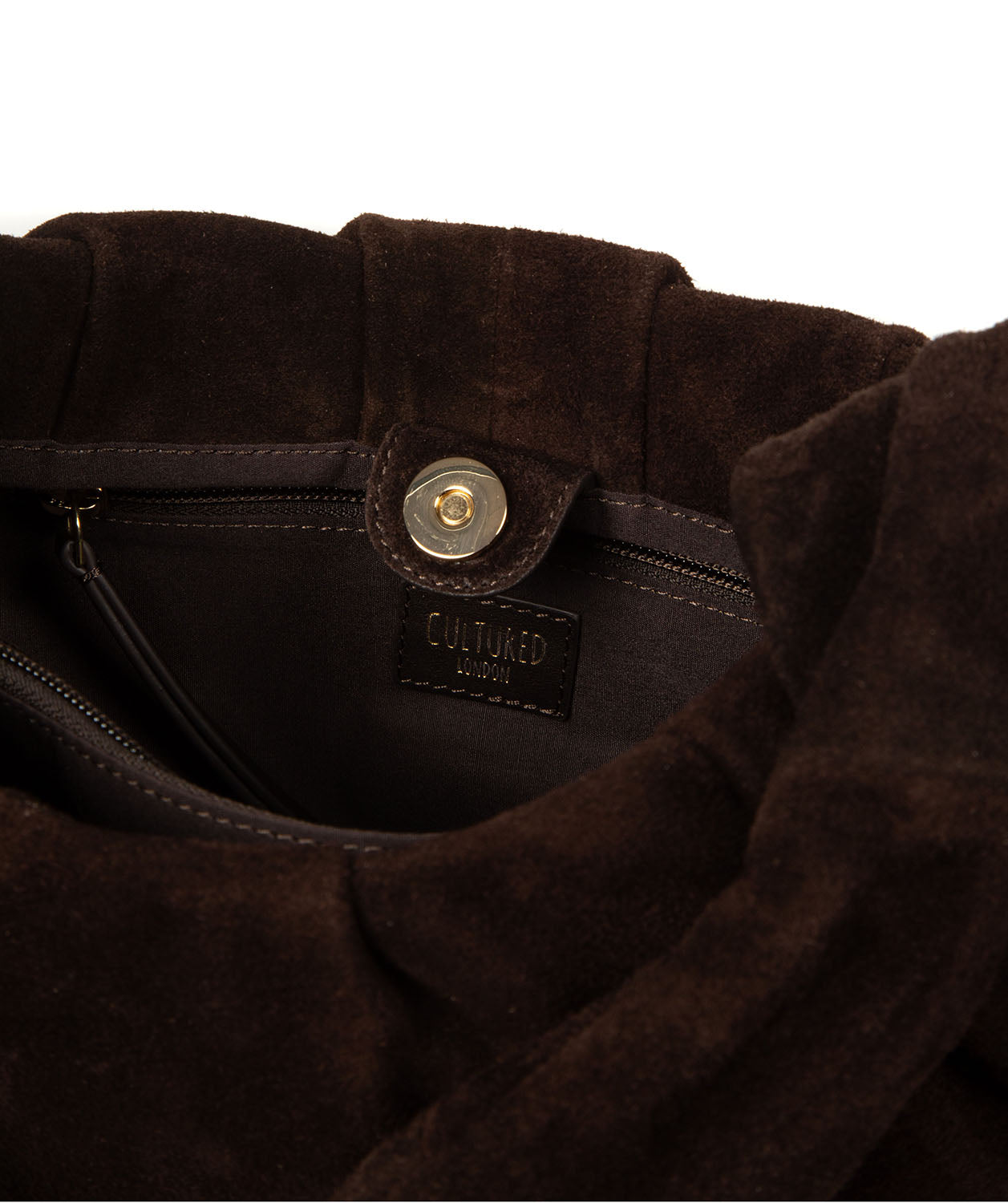 Front detail showing blind embossed logo and slip pocket
