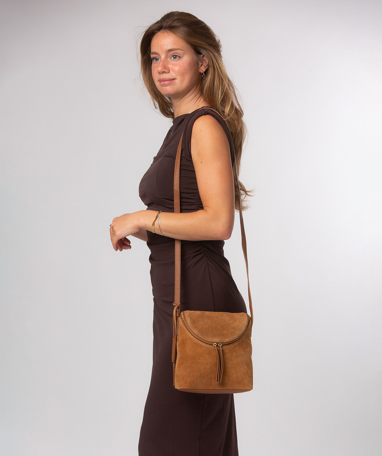 Rear zipped security pocket and leather shoulder strap