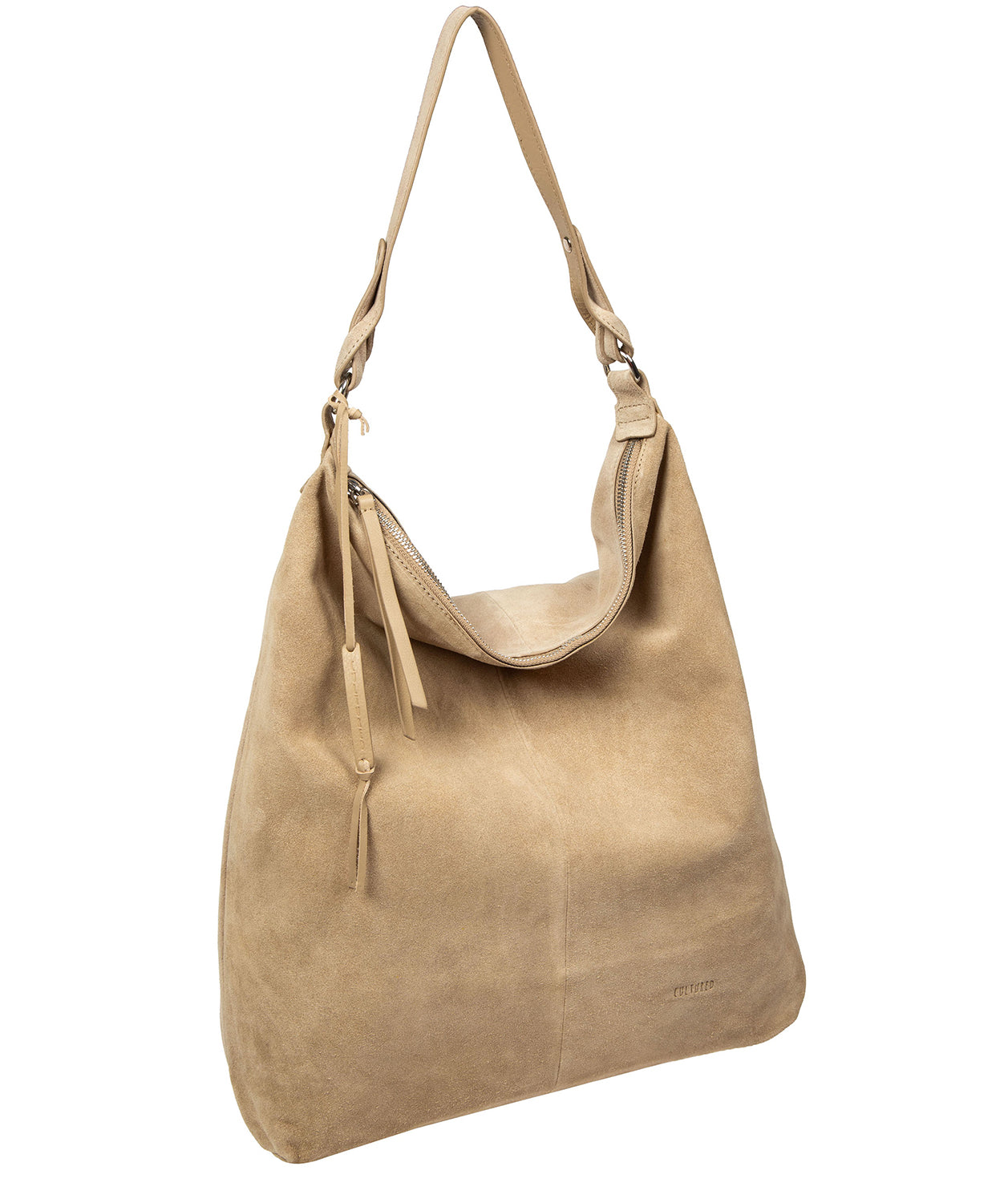 Shoulder strap and hanging charm detail on beige tote