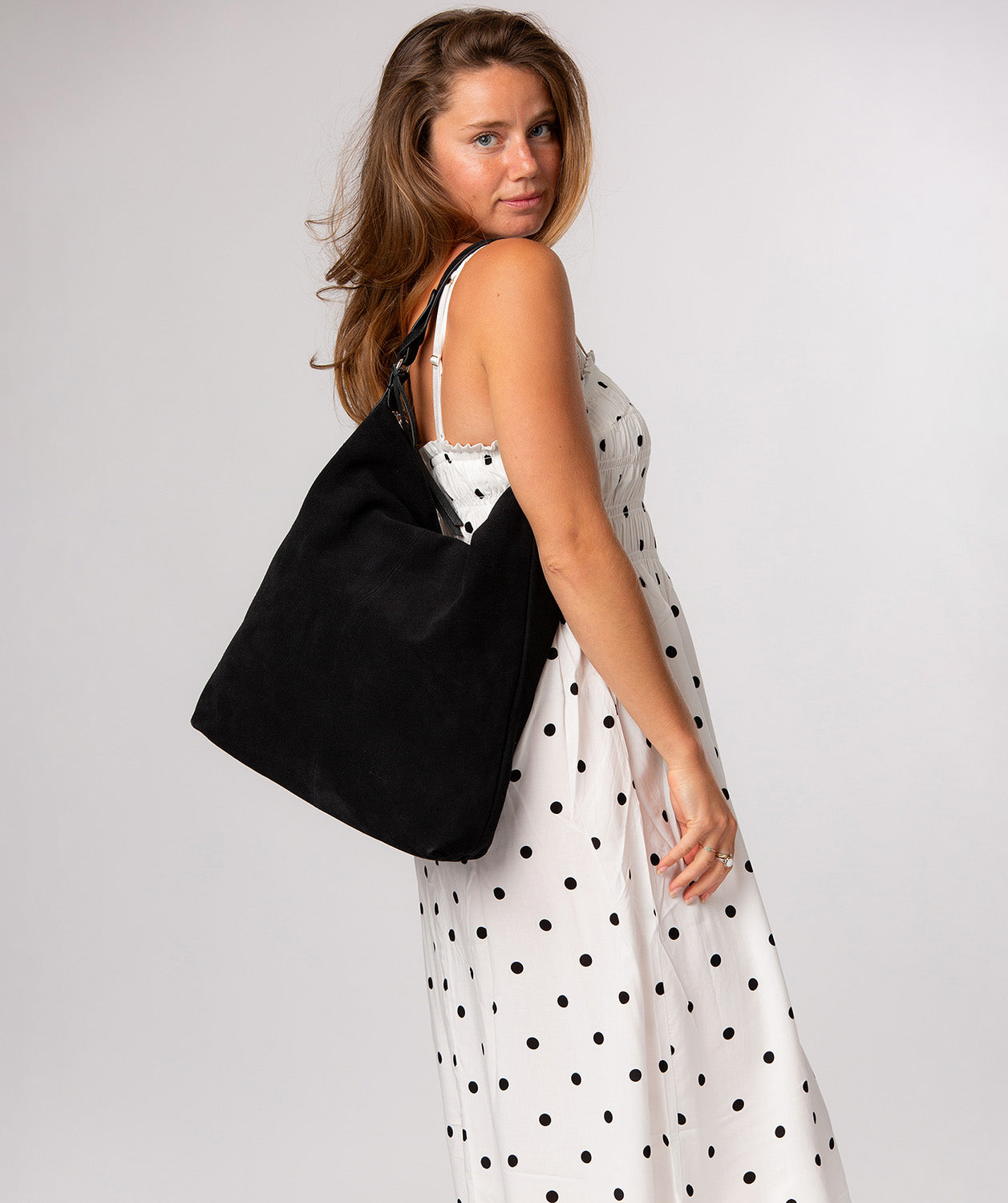 Harmony tote bag angled side profile showing carry strap