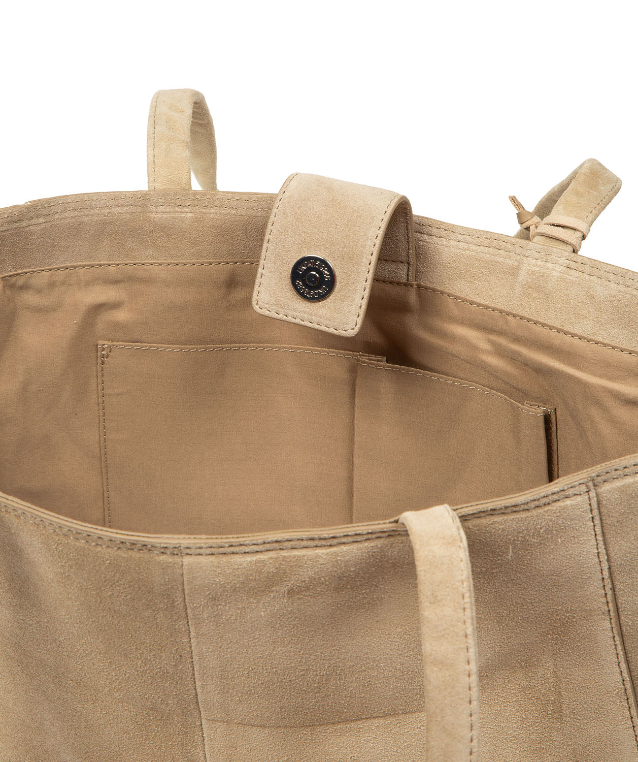 Close-up texture of soft beige suede material