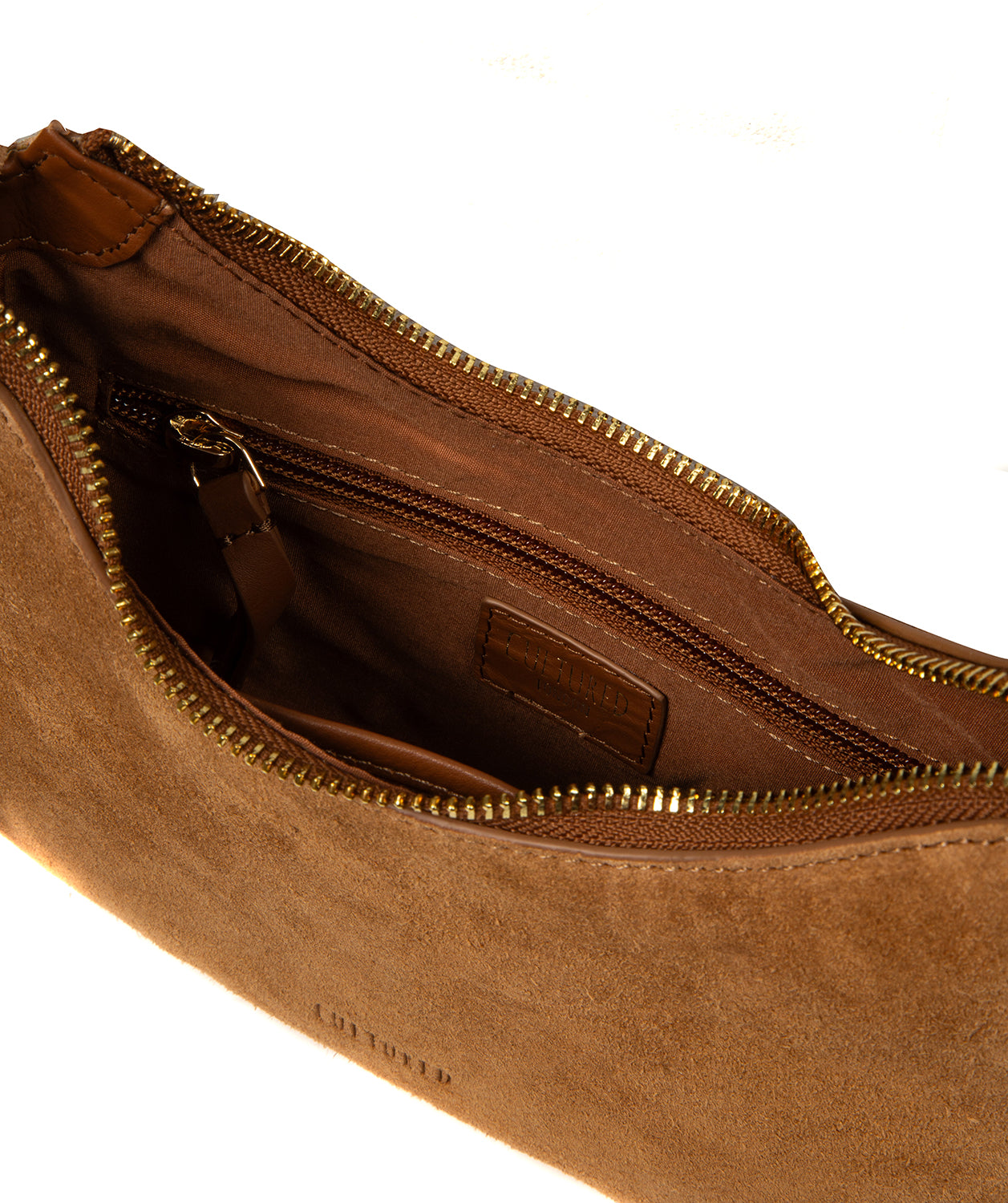 adjustable leather handle and tassel embellishment