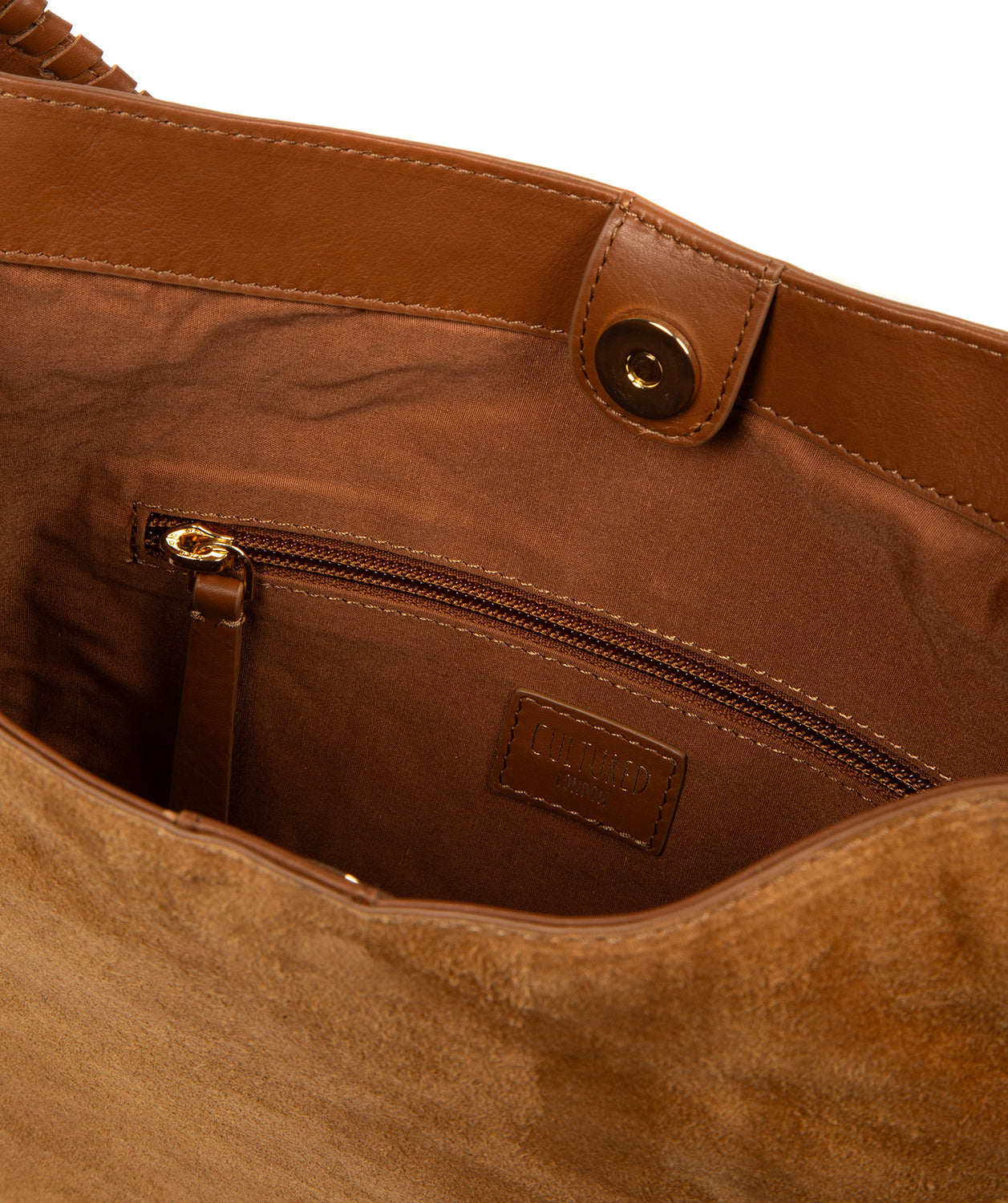 Adjustable tan suede shoulder strap with woven leather detailing