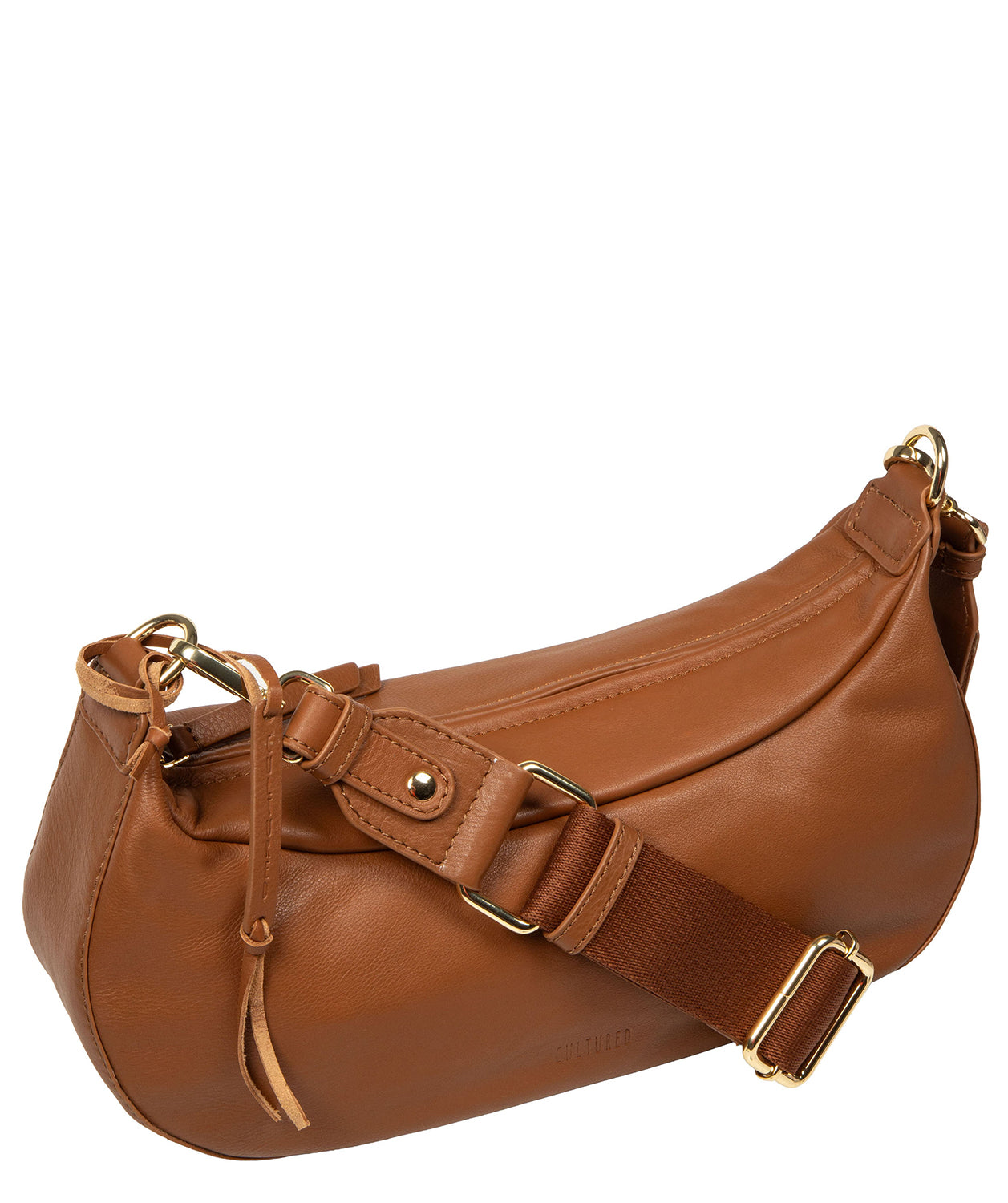 Tan leather texture detail showing natural patina development
