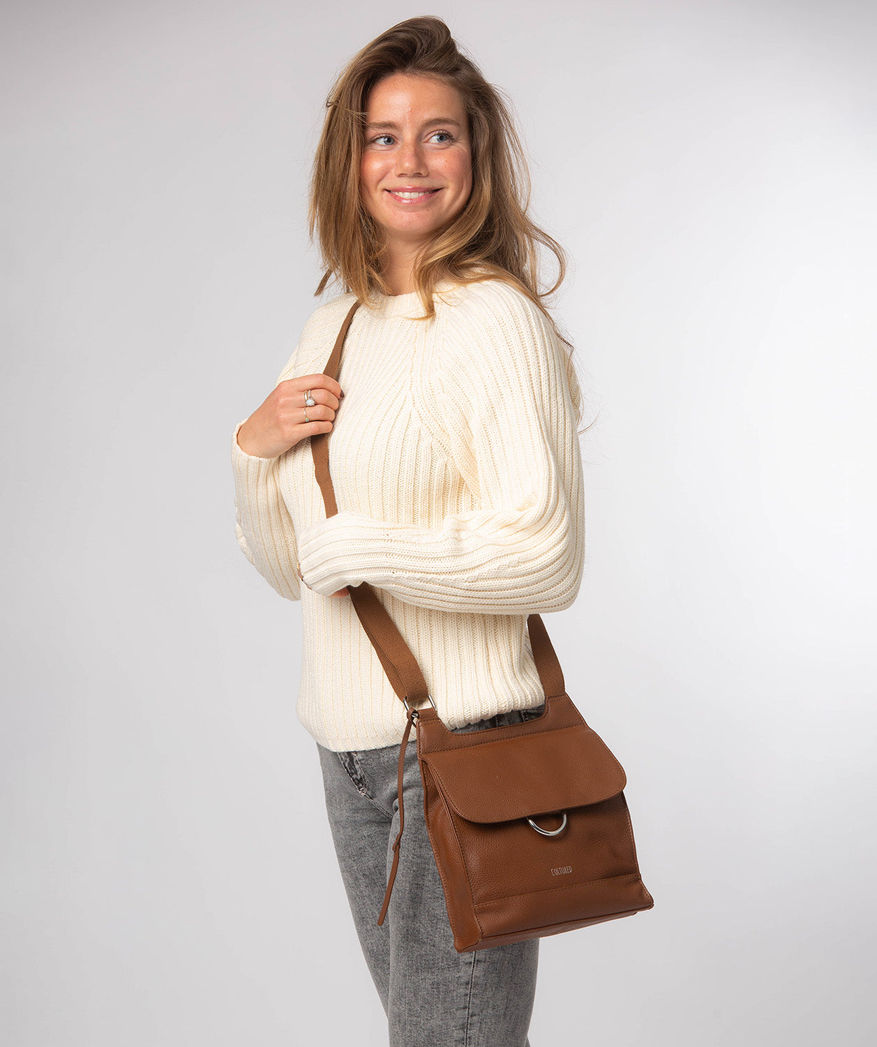 Cultured London Leigh rich tan pebble grain leather crossbody bag front view