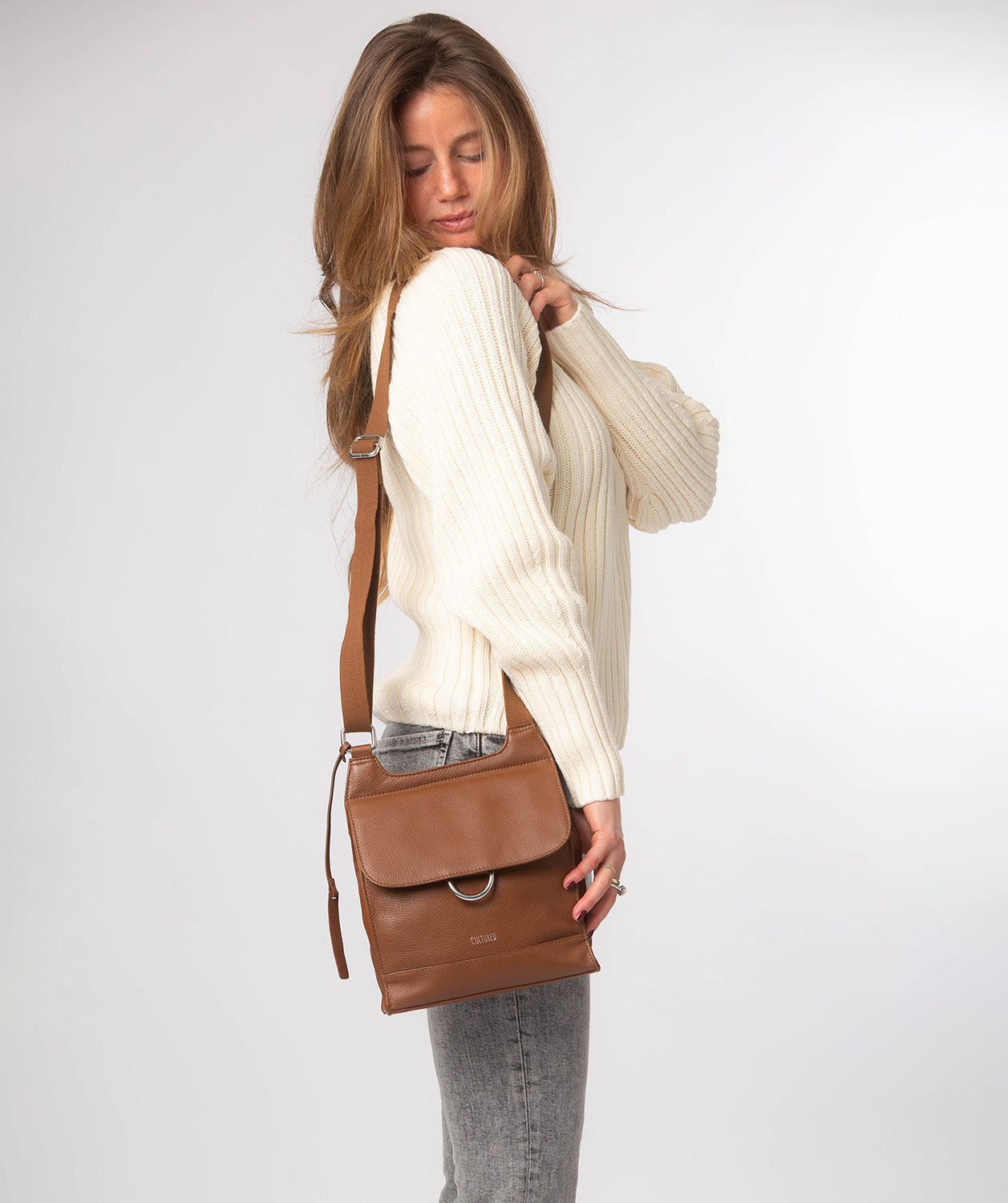 Adjustable webbed canvas shoulder strap with silver metal fittings