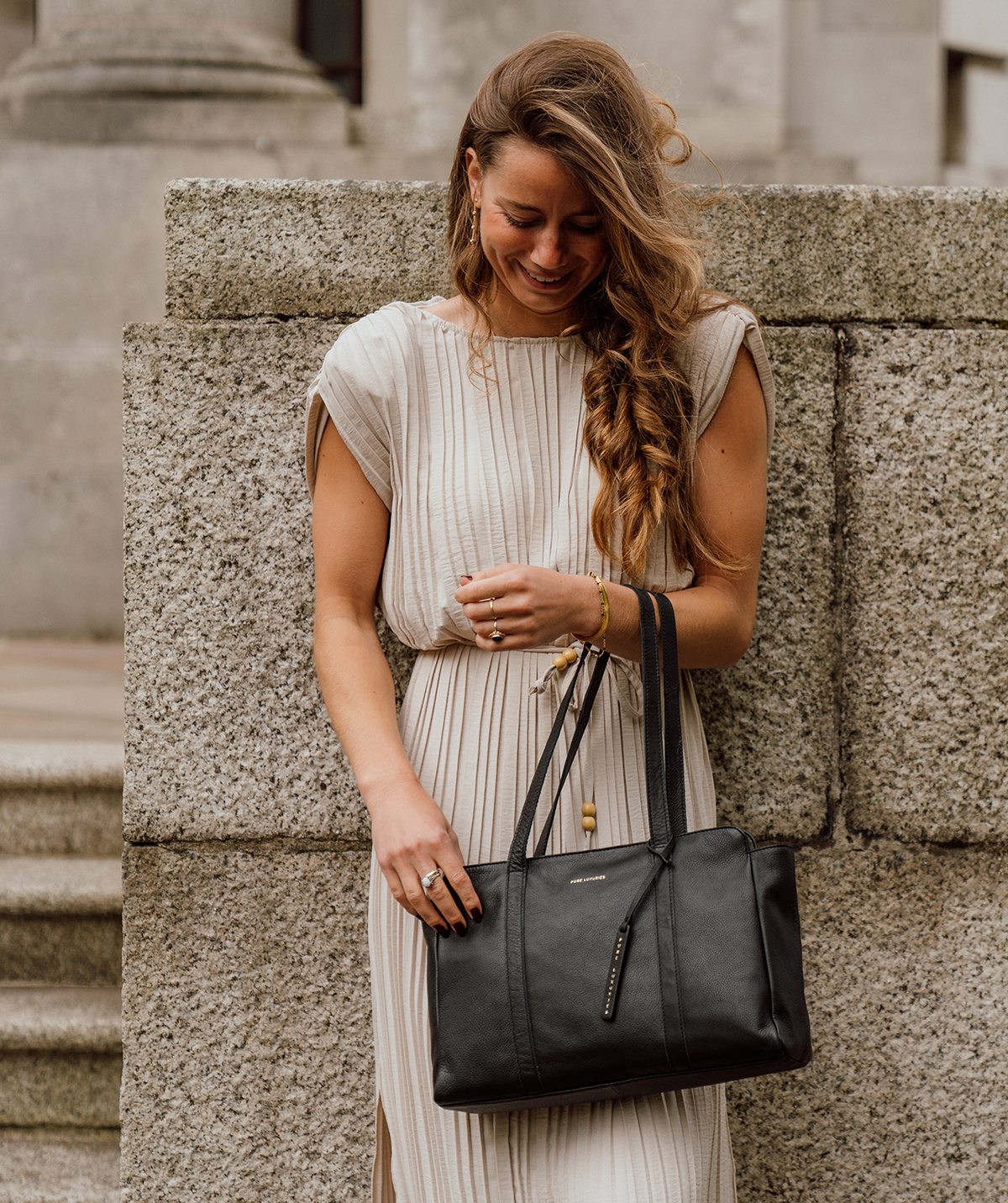 Olney handbag with charm accessory lifestyle styling