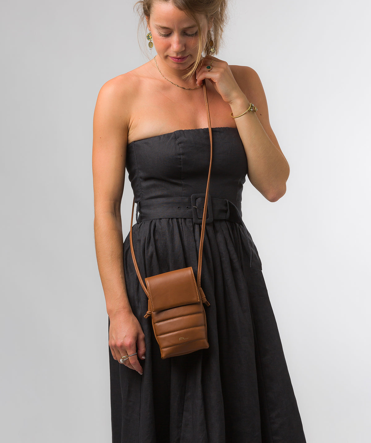 crossbody bag side profile with adjustable shoulder strap