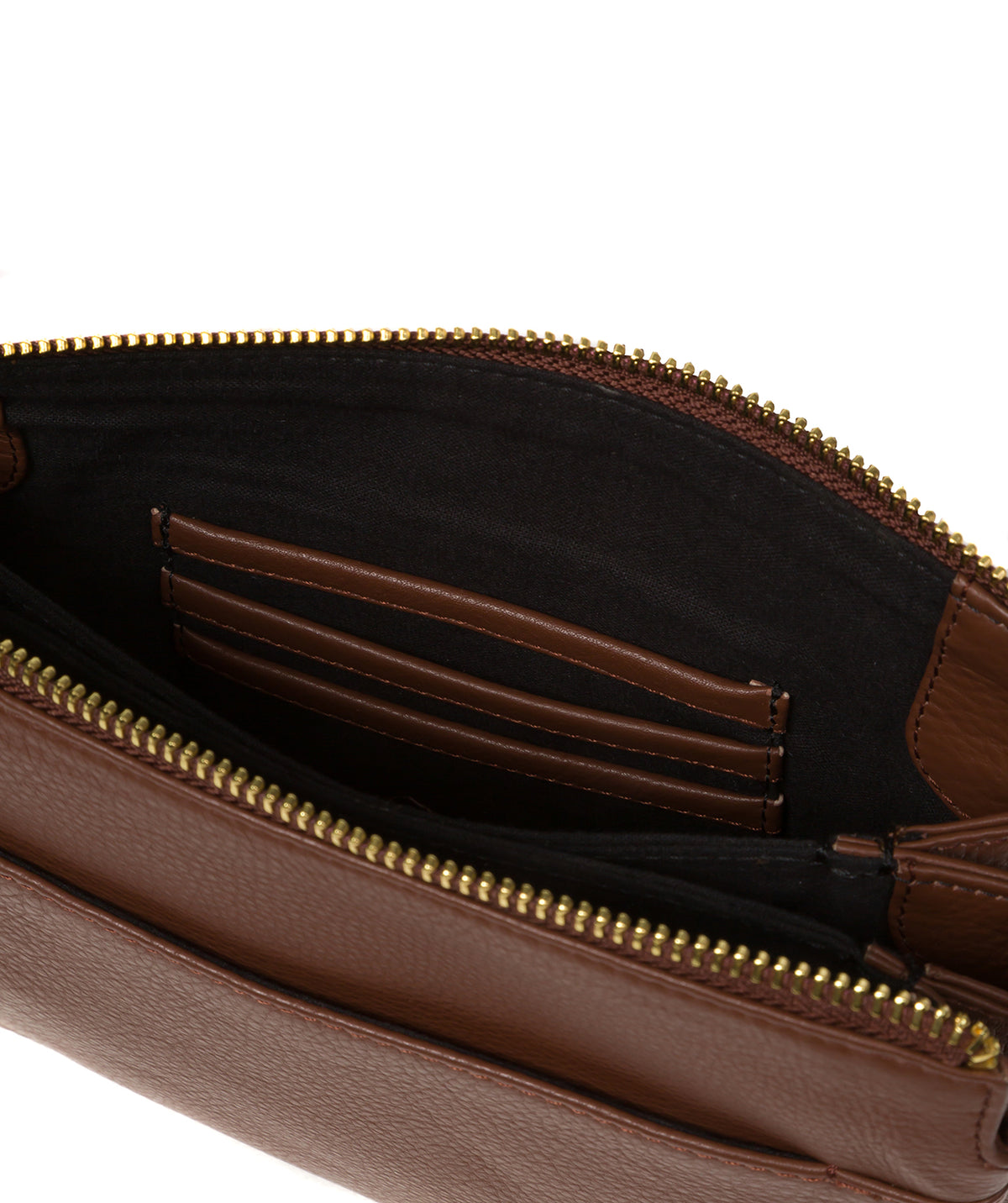 Interior compartment and zip pocket details of Niki bag