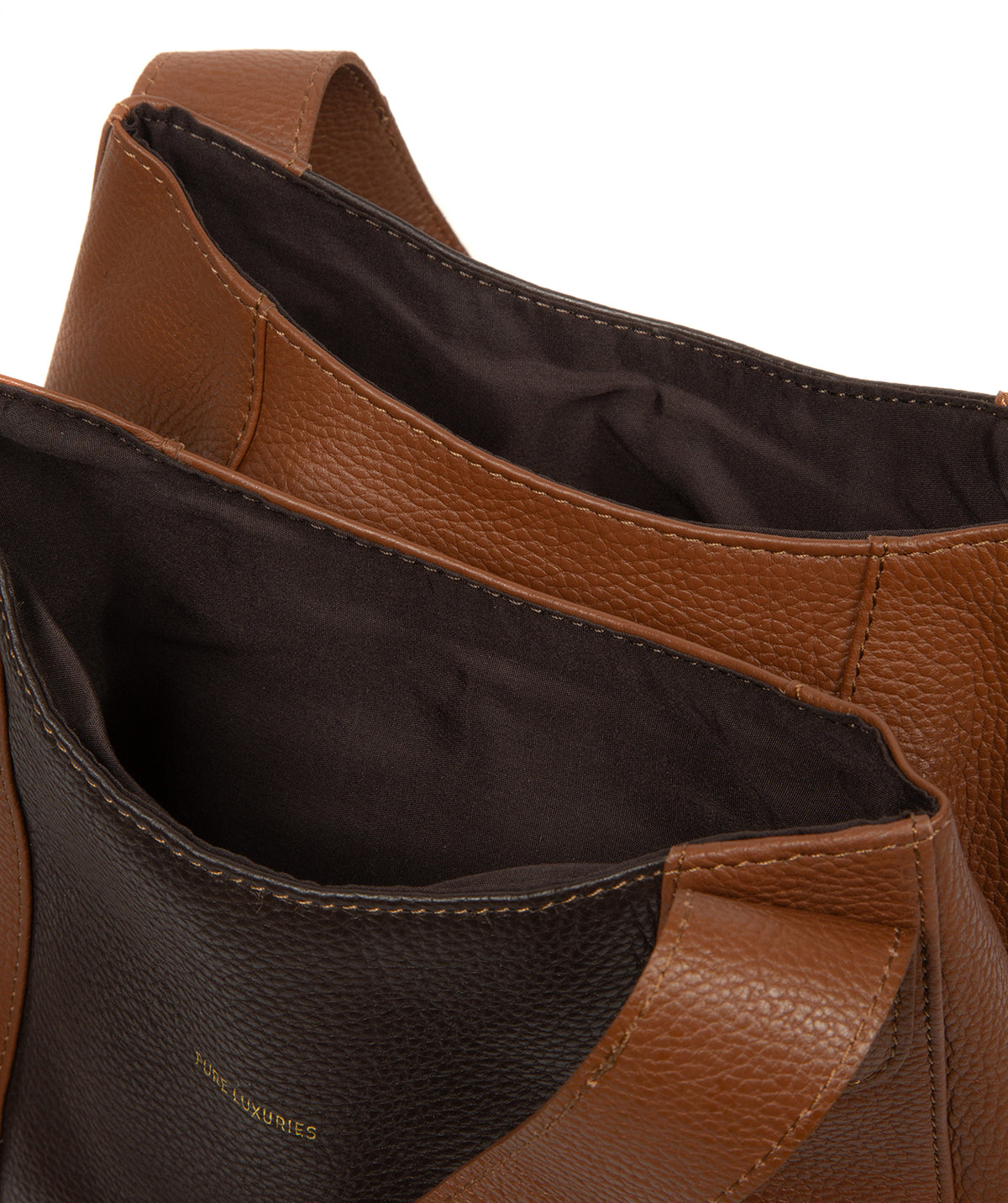 Pure Luxuries branded leather charm and logo detail