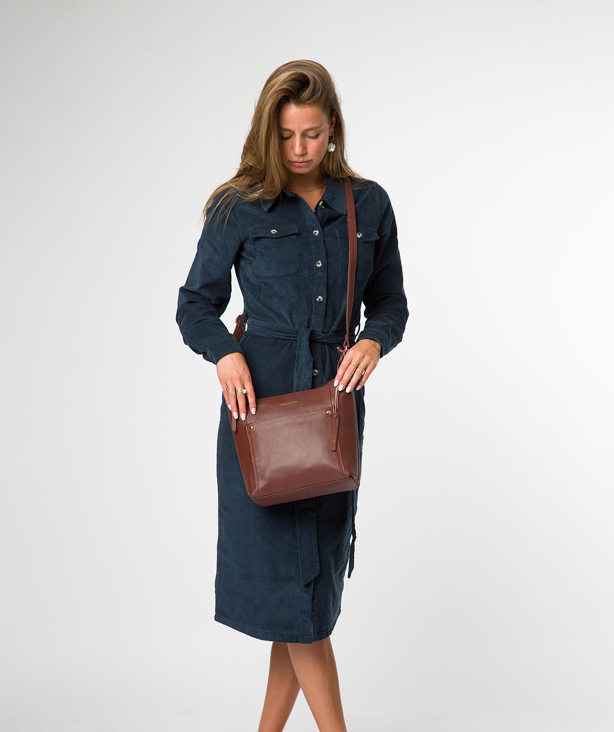 Exterior slip pocket with decorative stud detail