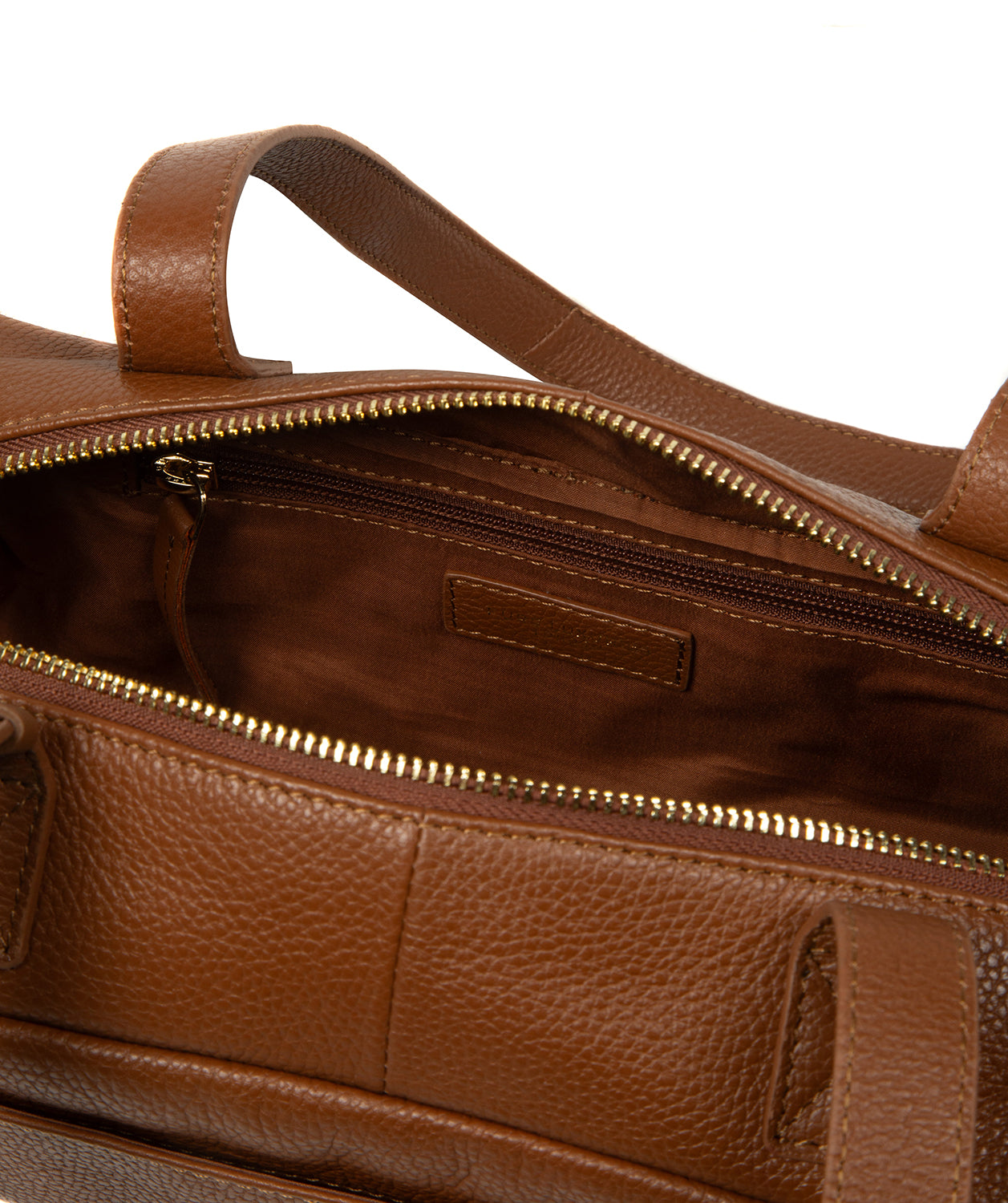 Gold-coloured zip and hardware close-up detail