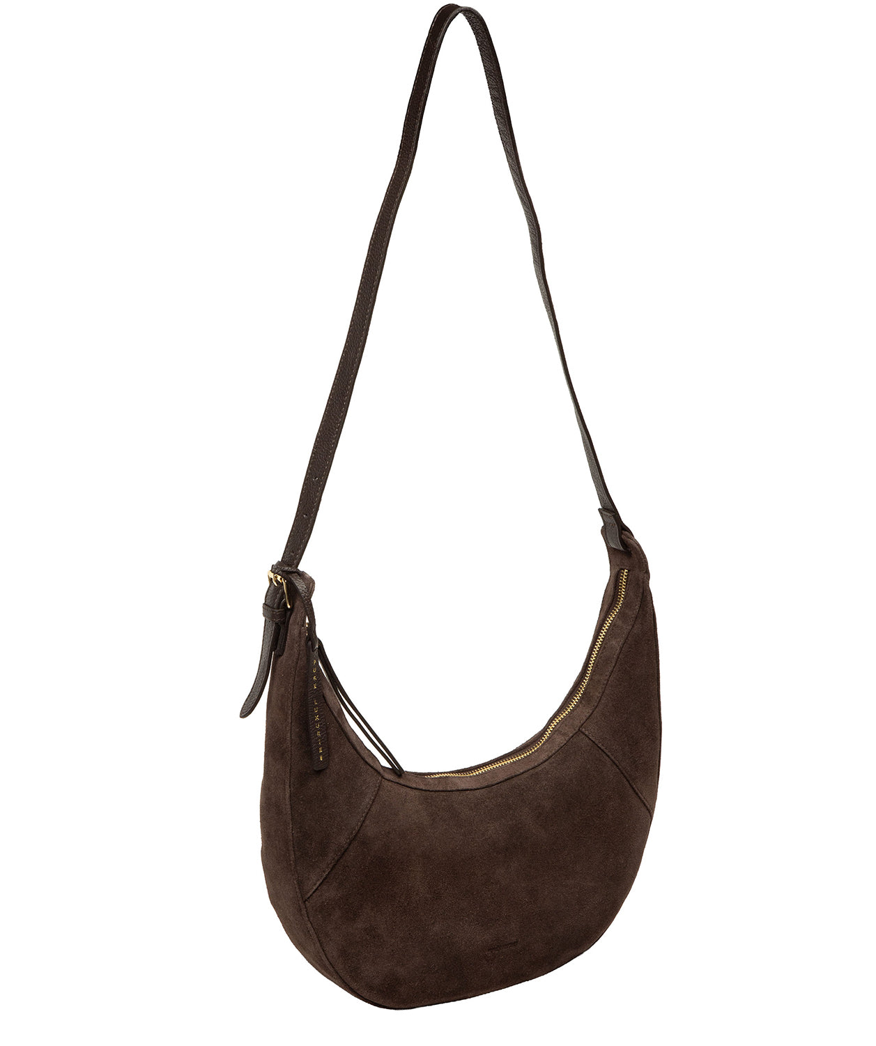 Close-up of soft suede texture and gold metal hardware