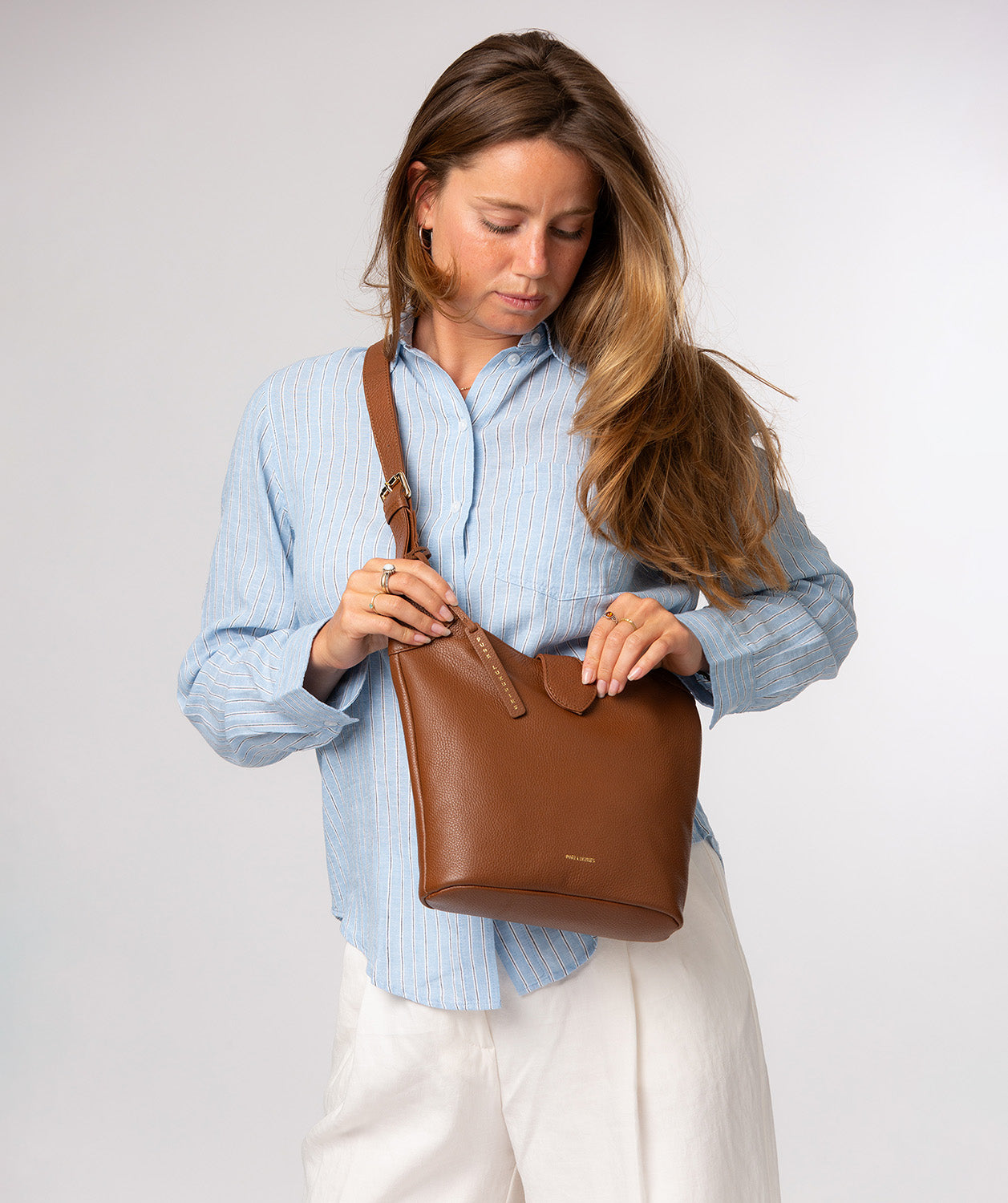 Aria bag interior fully lined with slip pockets and zipped compartment