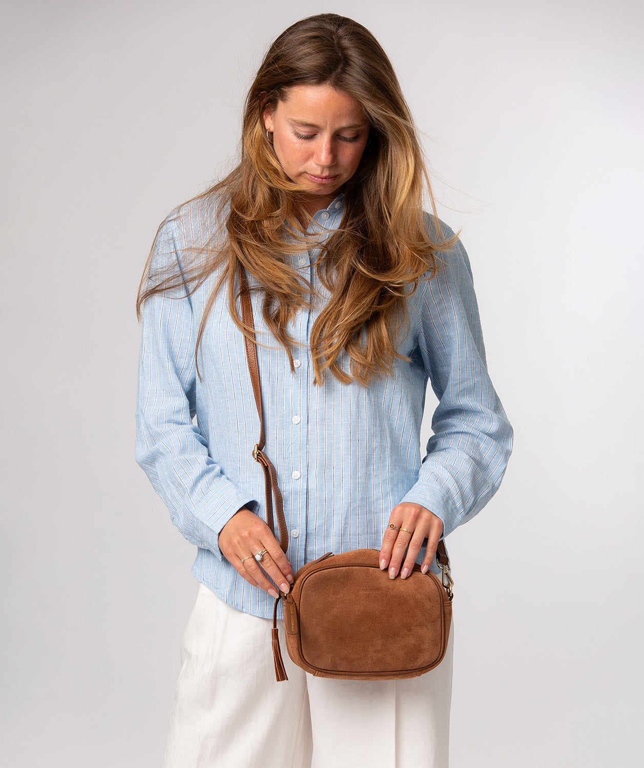 Fable crossbody bag side profile with adjustable leather strap